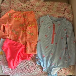 Two Cat & Jack baby swimsuits
